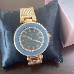 Reloj color gold